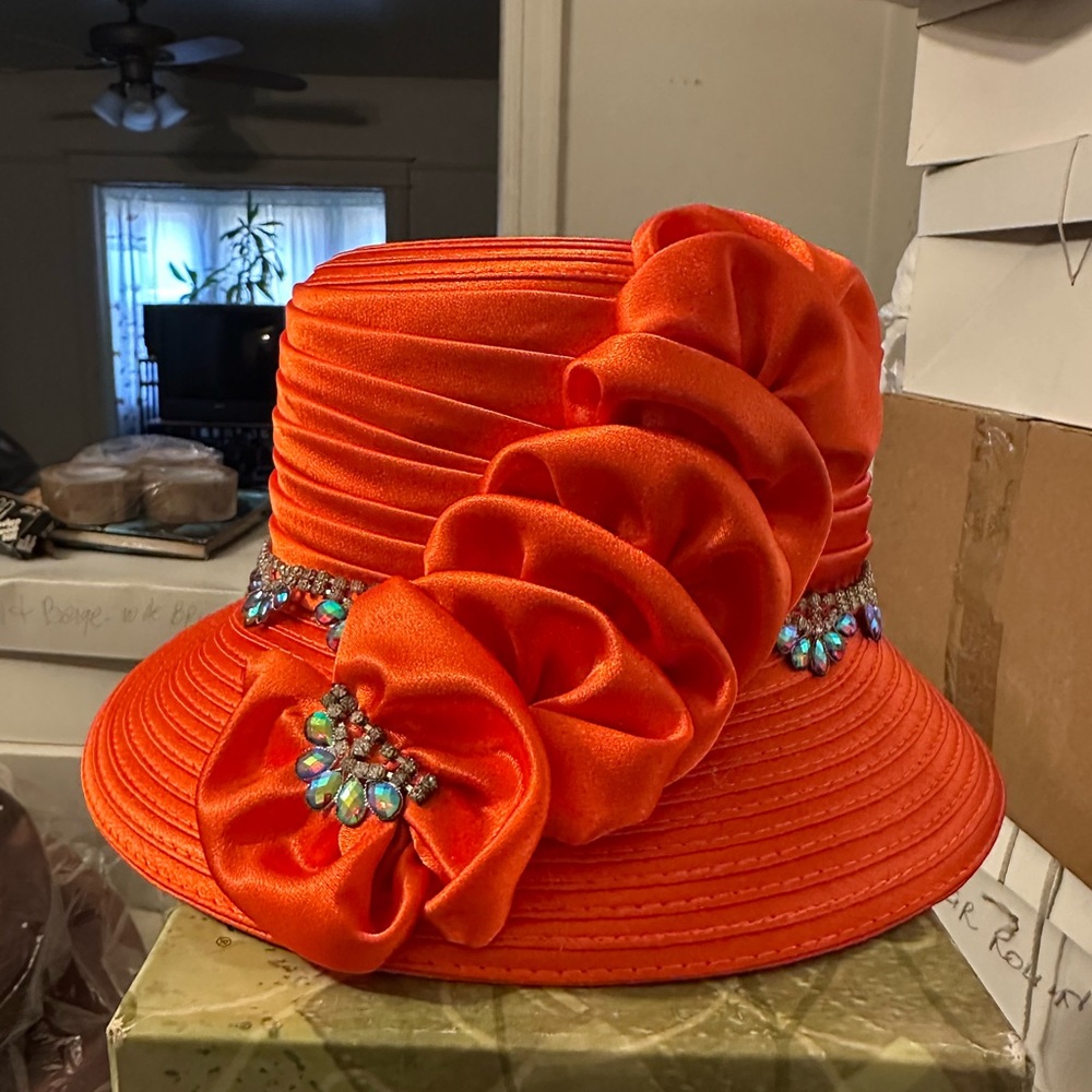 Vibrant Orange Wide-Brimmed Hat with Floral Accents